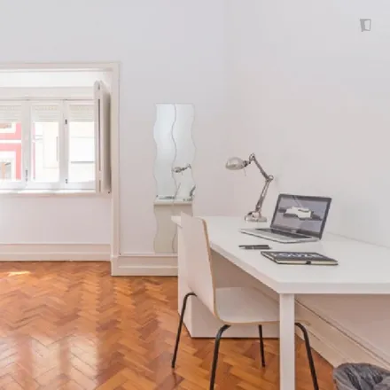 Rent this 12 bed room on Rua de São Félix in 1200-701 Lisbon, Portugal