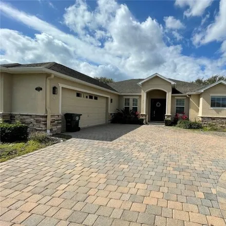 Rent this 4 bed house on 699 Demetree Lane in Oviedo, FL 32765