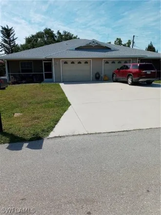 Buy this 4 bed house on 319 Tudor Drive in Cape Coral, FL 33904