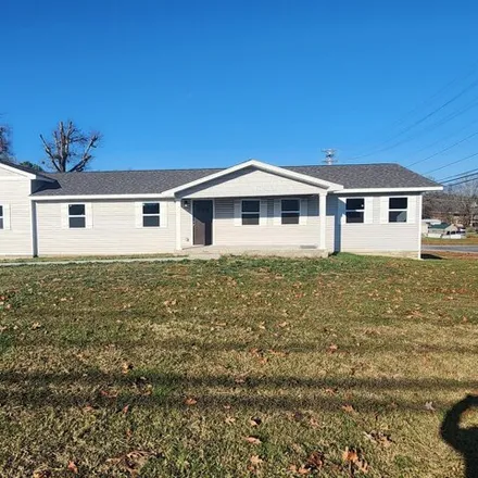 Buy this 4 bed house on 518 West 3rd Avenue in Oneida, Scott County
