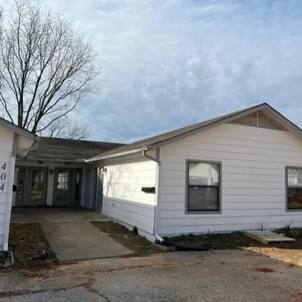 Rent this 2 bed house on 404 Southeast G Street in Bentonville, AR 72712