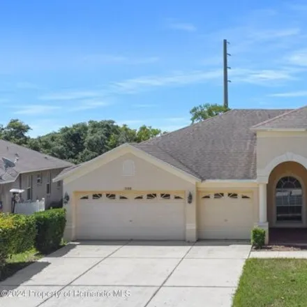 Rent this 4 bed house on 14176 Powell Road in Spring Hill, FL 34609