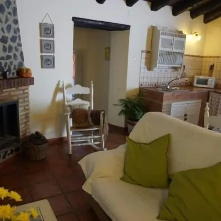 Rent this 3 bed townhouse on Fuenteheridos in Andalusia, Spain