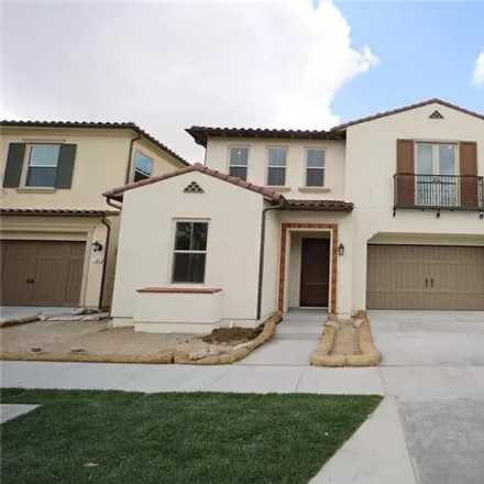Rent this 4 bed house on 143 Ceremony in Irvine, CA 92618