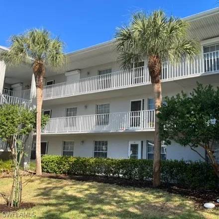 Rent this 2 bed condo on 14459 Lakewood Trace Court in Cypress Lake, FL 33919