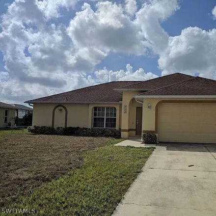 Rent this 3 bed house on 3745 16th Street West in Lehigh Acres, FL 33971