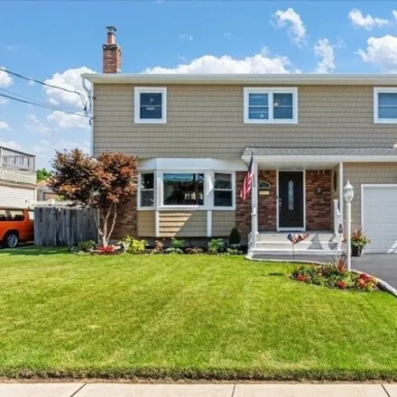 Buy this 4 bed house on 243 N Albany Ave in Massapequa, New York