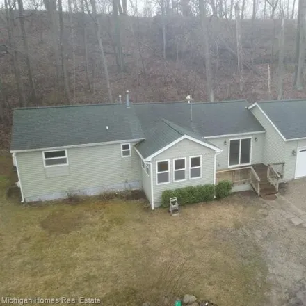 Buy this 2 bed house on 823 Little School Lot Lake Road in Oakland County, MI 48442