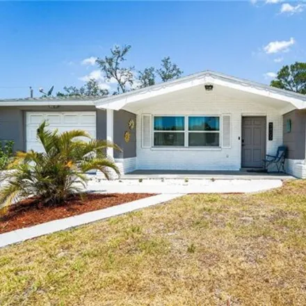 Buy this 3 bed house on 5405 Golden Nugget Dr in Holiday, Florida
