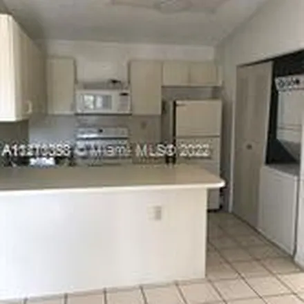 Rent this 3 bed apartment on 7655 Southwest 153rd Court in Miami-Dade County, FL 33193