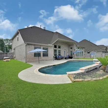 Buy this 4 bed house on 18899 Collins View Drive in Montgomery County, TX 77357