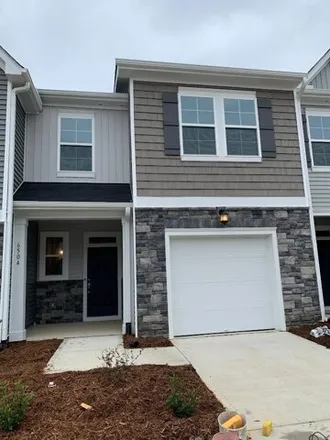 Rent this 3 bed townhouse on Tremolo Trail in Wake County, NC 27616