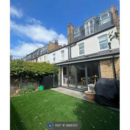 Rent this 4 bed townhouse on 71 Pirbright Road in London, SW18 5NA