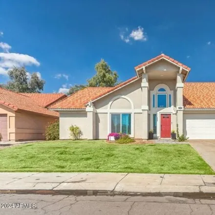 Rent this 4 bed house on 7344 West Morrow Drive in Glendale, AZ 85308