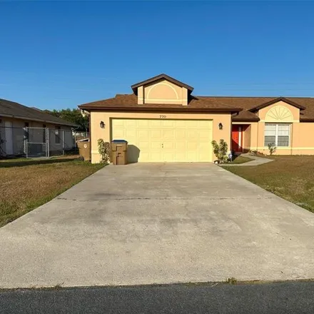 Rent this 3 bed house on 782 Americana Court in Poinciana, FL 34758