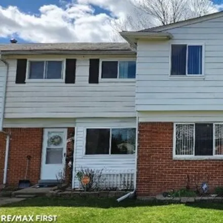 Buy this 4 bed townhouse on 19843 Abrahm Street in Broad Acres, Clinton Township