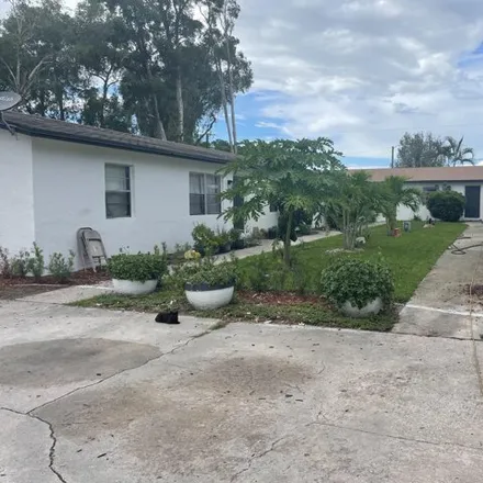 Rent this 3 bed house on 4019 Herbertz Road in Lake Worth Corridor, Palm Beach County