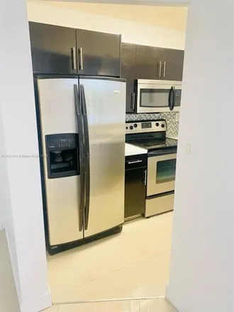 Image 2 - 7075 Northwest 186th Street, Country Club, Miami-Dade County, FL 33015, USA - Condo for rent
