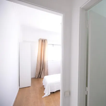 Rent this 4 bed room on Caixa Geral de Depósitos in Rua Morais Soares, 1170-008 Lisbon