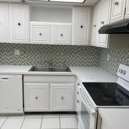 Rent this 2 bed apartment on 2984 Presidential Way in West Palm Beach, FL 33401