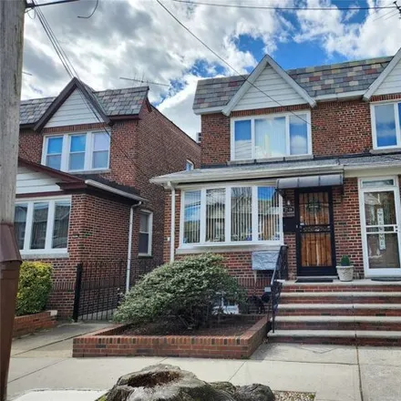 Buy this 3 bed house on 77-08 86th Street in New York, NY 11385