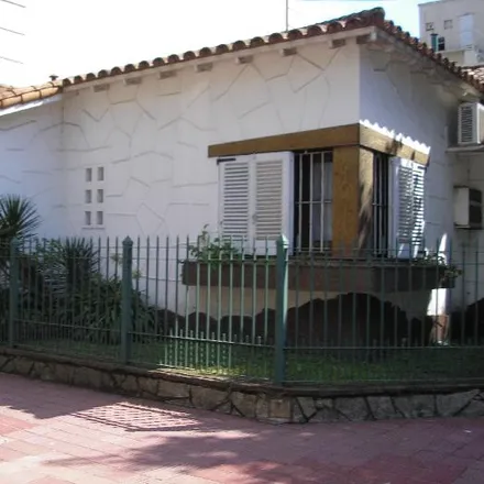 Buy this 3 bed house on Carlos Pellegrini 305 in Partido de Lomas de Zamora, 1832 Lomas de Zamora