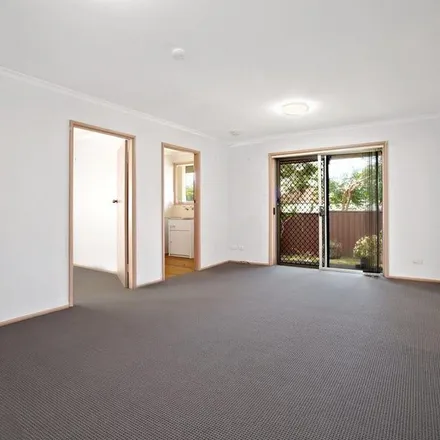 Rent this 4 bed apartment on Tantani Avenue in Green Valley NSW 2168, Australia