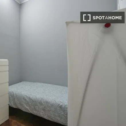 Rent this 14 bed room on Avenida Visconde de Valmor in 1050-070 Lisbon, Portugal