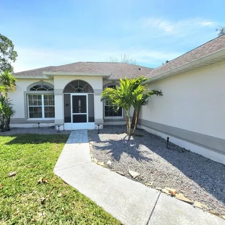 Rent this 3 bed house on 960 Hunters Creek Drive in West Melbourne, FL 32904