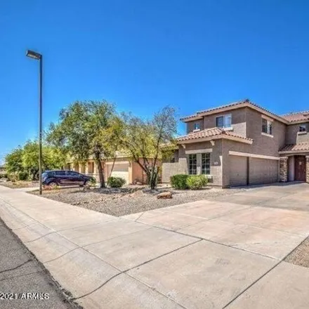 Rent this 4 bed house on 17584 West Acacia Court in Goodyear, AZ 85338