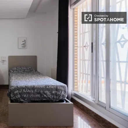 Rent this 6 bed room on Carrer de Borrull in 46008 Valencia, Spain