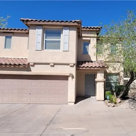 Rent this 4 bed house on 1102 East Blue Magenta Avenue in Paradise, NV 89183