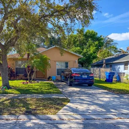 Buy this 3 bed house on 2325 West 28th Street in Riviera Beach, FL 33404