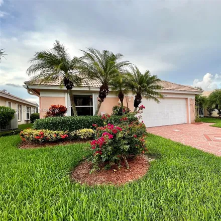 Buy this 3 bed house on 12995 Hampton Marla Lakes Drive in Delray Gardens, Palm Beach County
