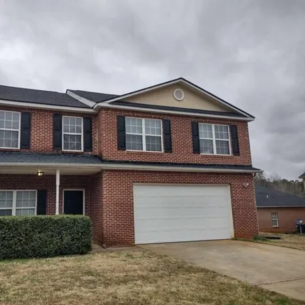 Rent this 4 bed house on 255 Cranesbill Way in Locust Grove, GA 30248