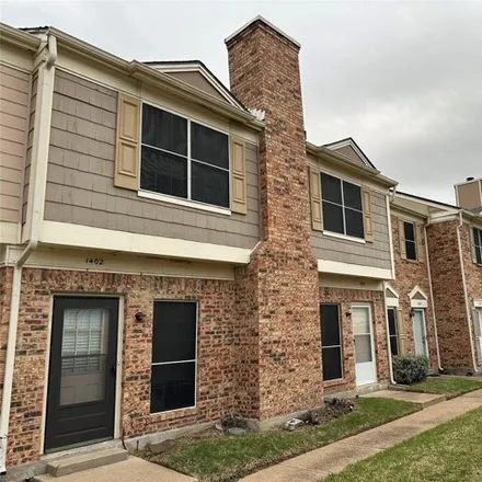 Rent this 2 bed condo on 14th Street in Plano, TX 75074