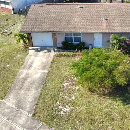 Buy this 2 bed house on 907 Bacon Circle Northeast in Palm Bay, FL 32905