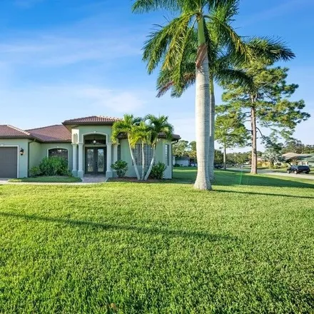 Buy this 4 bed house on 2073 Southwest Aaron Drive in Port Saint Lucie, FL 34953