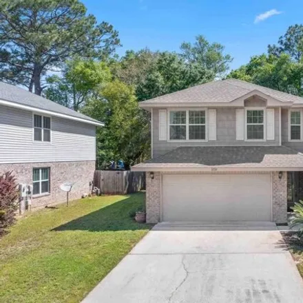 Buy this 4 bed house on 3744 Weatherstone Circle in Escambia County, FL 32507