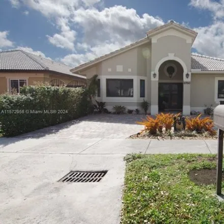 Rent this 3 bed house on 8750 Northwest 142nd Street in Miami Lakes, FL 33018