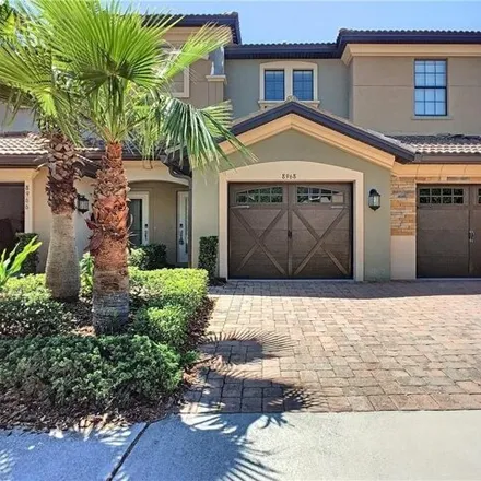 Rent this 3 bed condo on Golf Car Path in Osceola County, FL