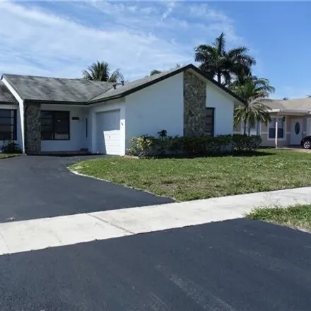 Rent this 3 bed house on 11752 Northwest 38th Place in Sunrise, FL 33323