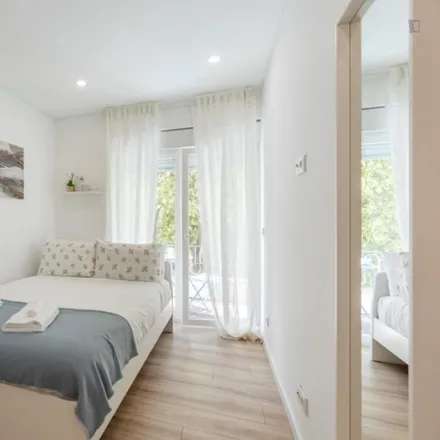 Rent this 2 bed room on Rua Passos Manuel 57 in 1150-258 Lisbon, Portugal
