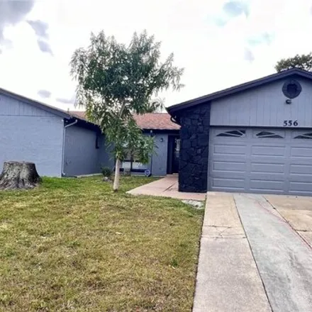 Buy this 4 bed house on 556 Royal Palm Drive in Buenaventura Lakes, FL 34743