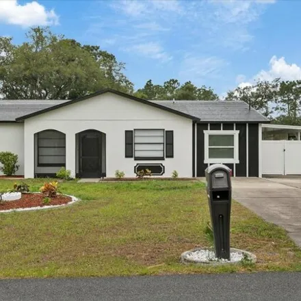 Buy this 4 bed house on 11112 Blythville Road in Spring Hill, FL 34608