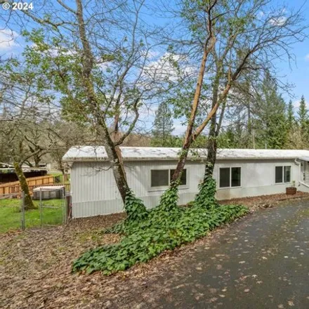 Buy this studio apartment on 5980 Cloverlawn Dr in Grants Pass, Oregon