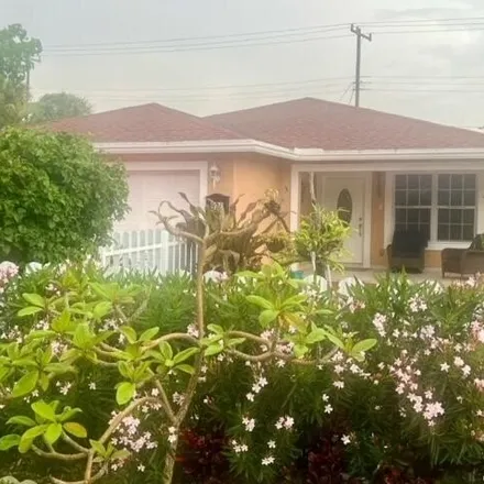 Buy this 4 bed house on 941 Alamanda Road in West Palm Beach, FL 33405