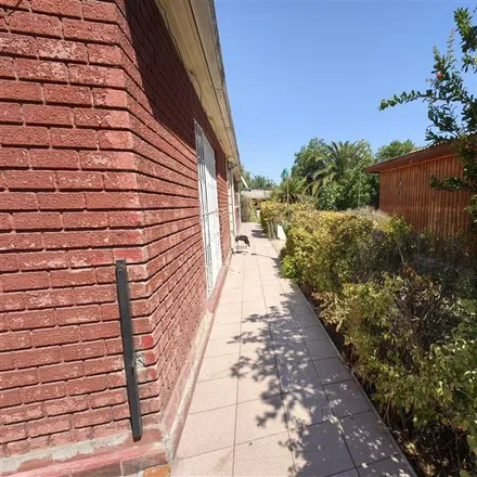 Buy this 4 bed house on Pasaje Colina 518 in 797 0671 Provincia de Santiago, Chile