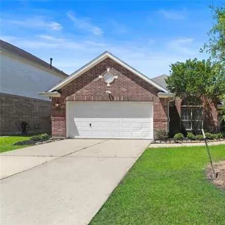 Rent this 3 bed house on 8679 Iris Arbor Lane in Copper Lakes, TX 77095