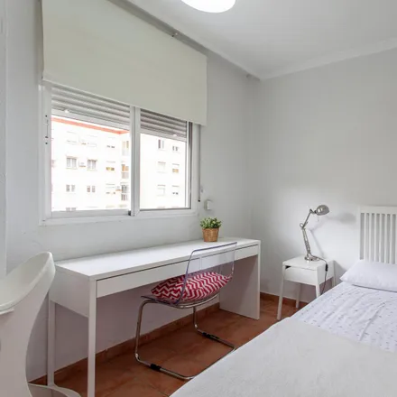 Rent this 4 bed room on Carrer del Poeta Andrés Cabrelles in 46022 Valencia, Spain
